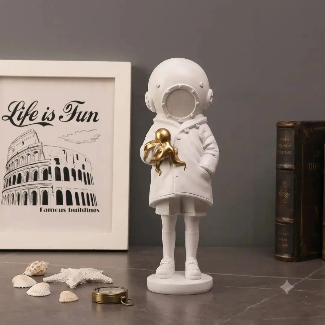 Astronaut Child Figurine with Golden Octopus Sculpture – Modern Space Art Decor Jumartins