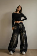 Calça preta com modelo